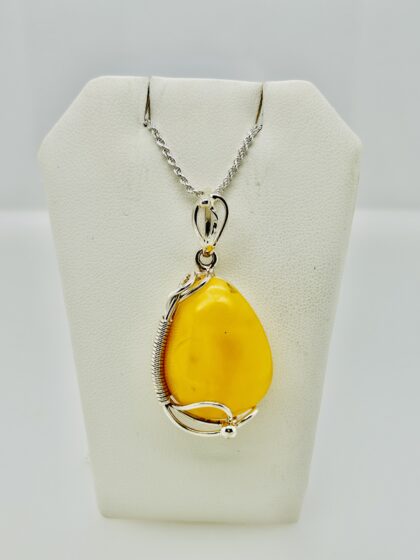 Asymmetrical coil amber pendant